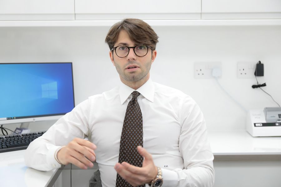 Dr Eric Battista in his consulting room